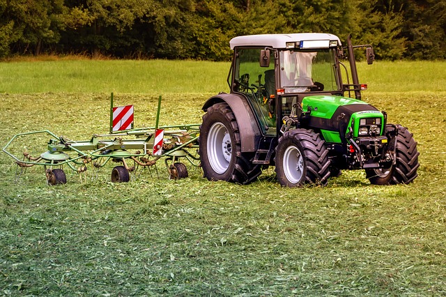 Tractor working in field